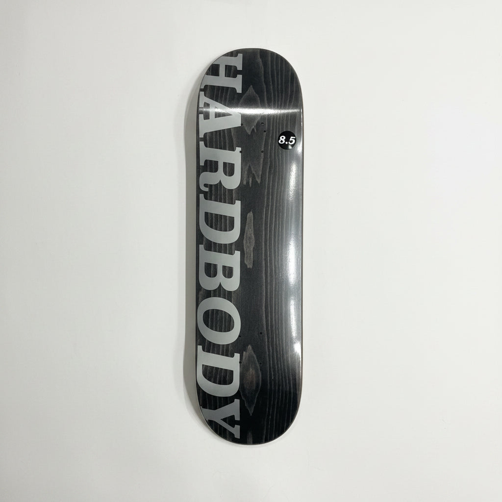 Skateboard deck with 'Hardbody' branding on a white surface