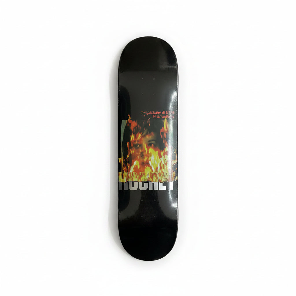 Skateboard deck with fiery design and text on a white surface