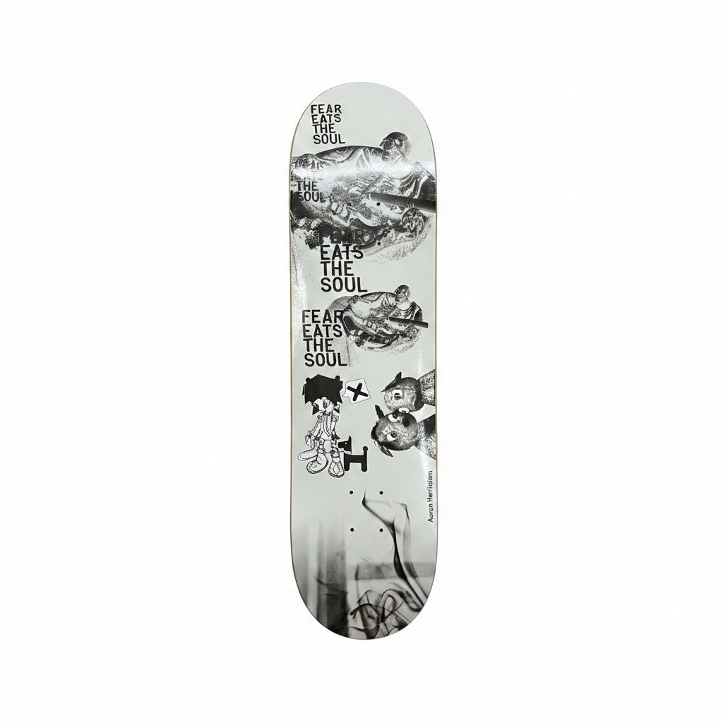 Skateboard deck with black and white graphics on a white background