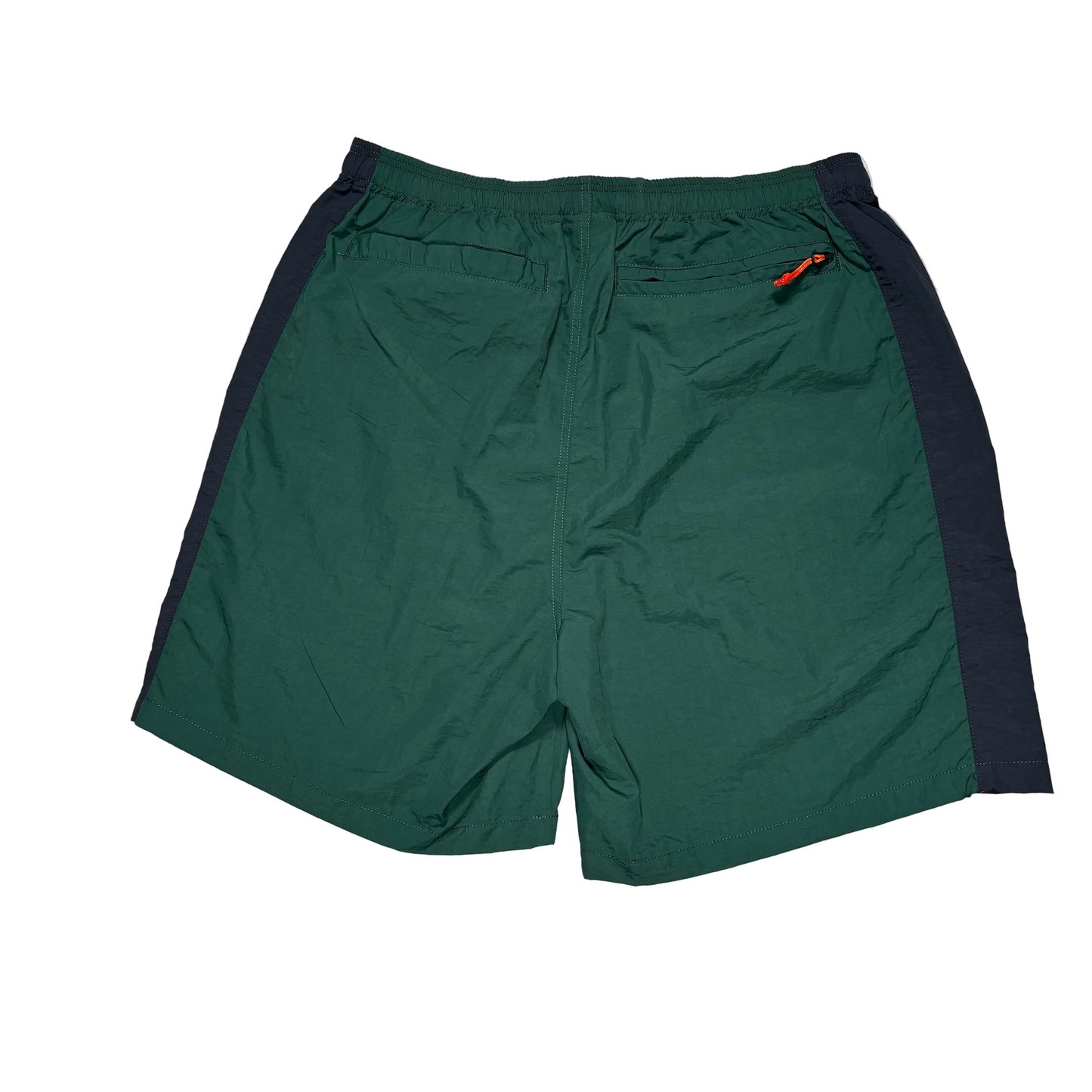 rear of green and blue nylon shorts on a white background
