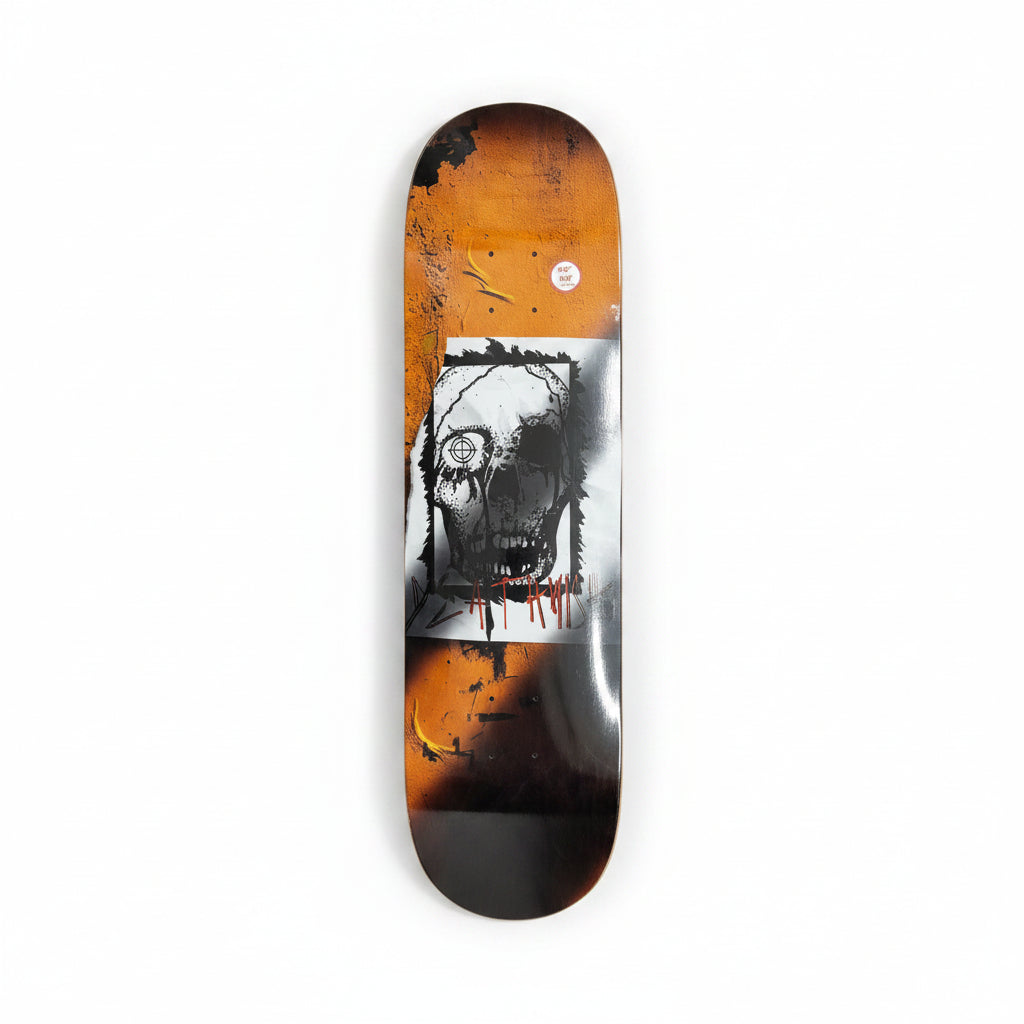 abstract graphic on skateboard deck of hand drawn skull with chipped wooden background