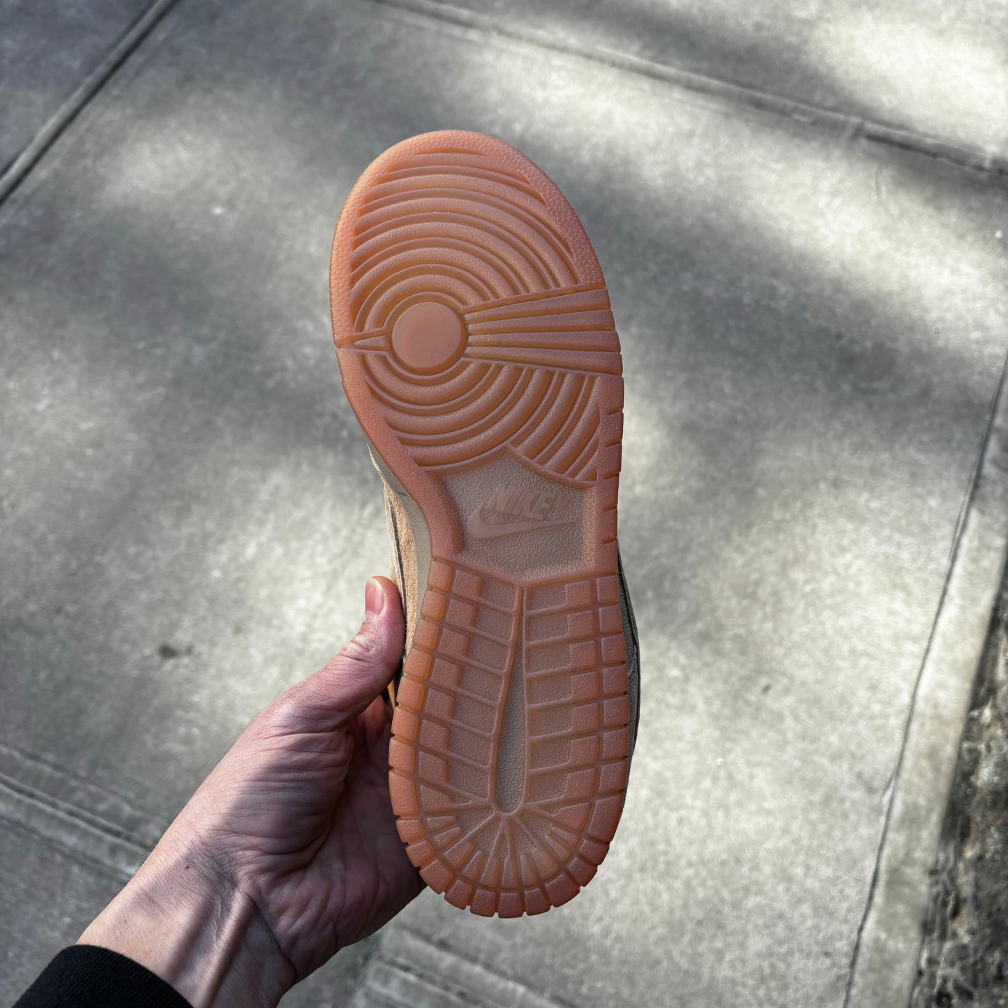 view of gumsole on suede lowtop sneaker