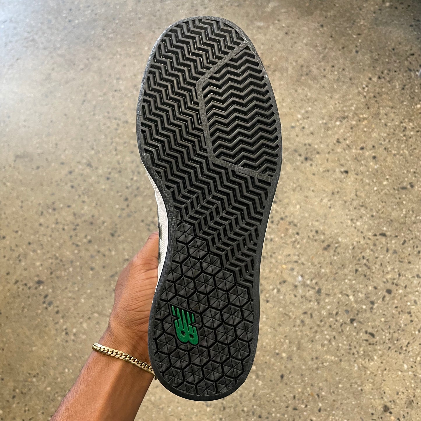 black and green sole, bottom of sneaker