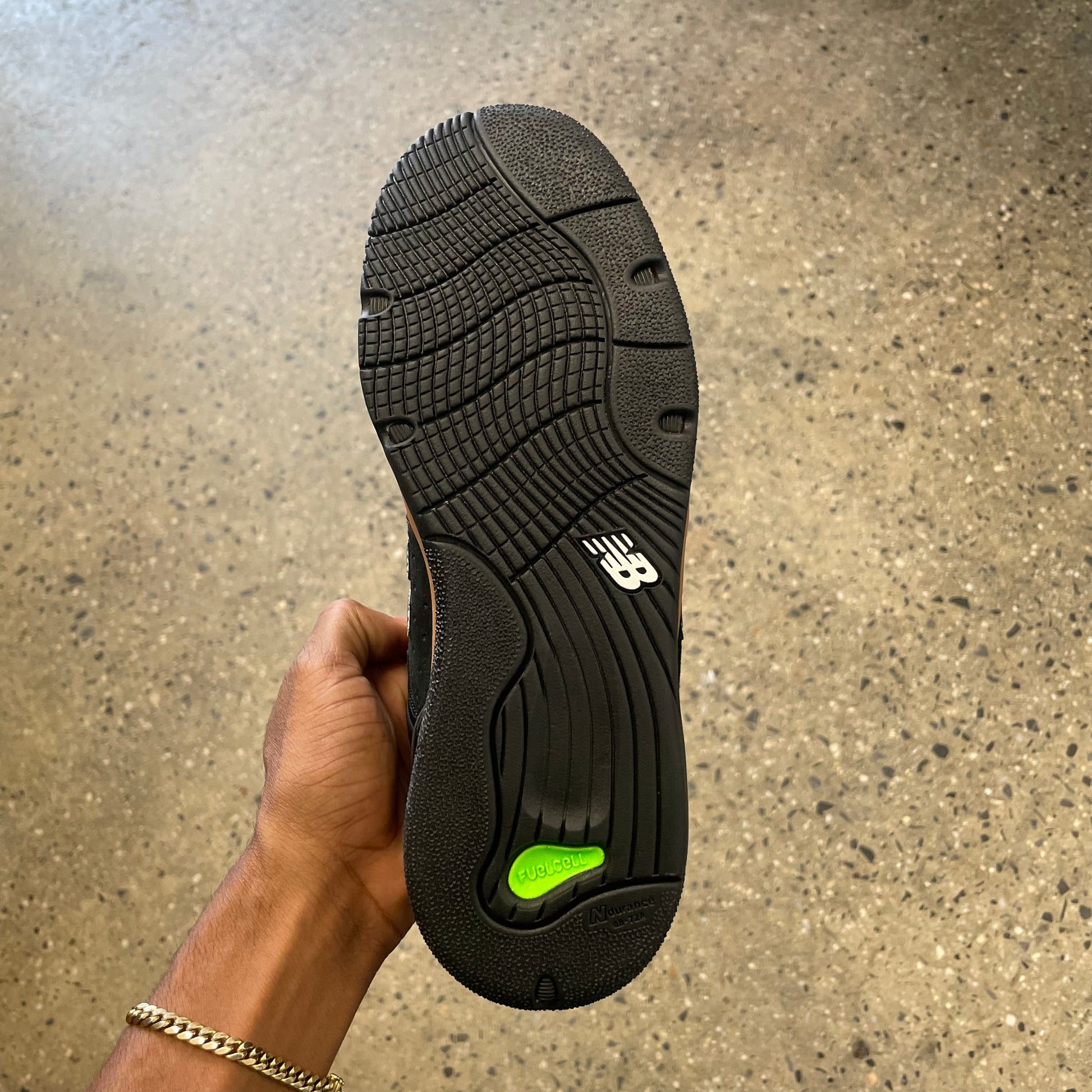 black and green sole, bottom of sneaker