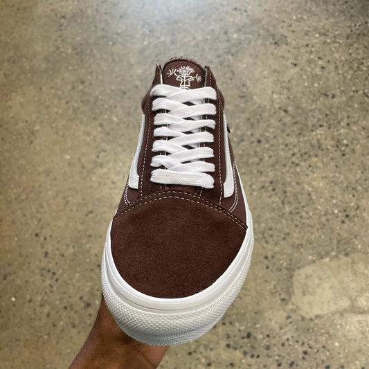top down view of laces and toe box of brown suede and canvas skate shoe