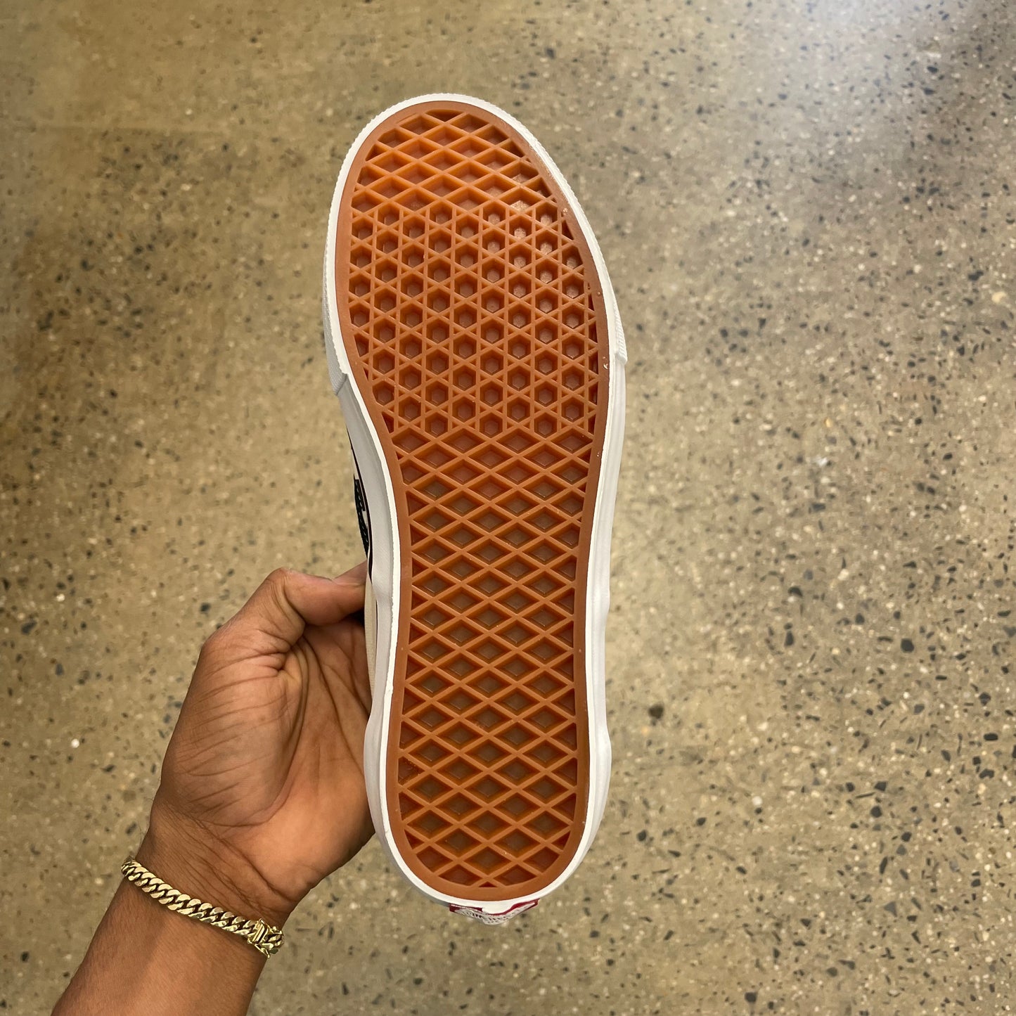 view of bottom of gum rubbe vans classic waffle grip outsole