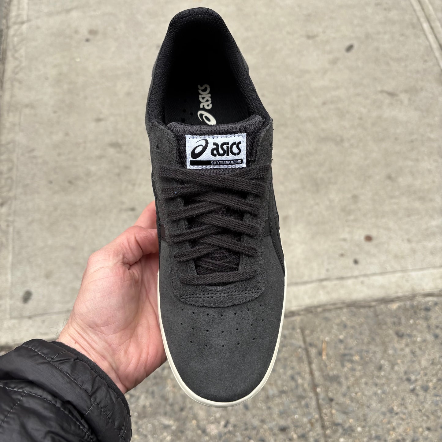 top down view of grey suede skateboard shoe with off white sole