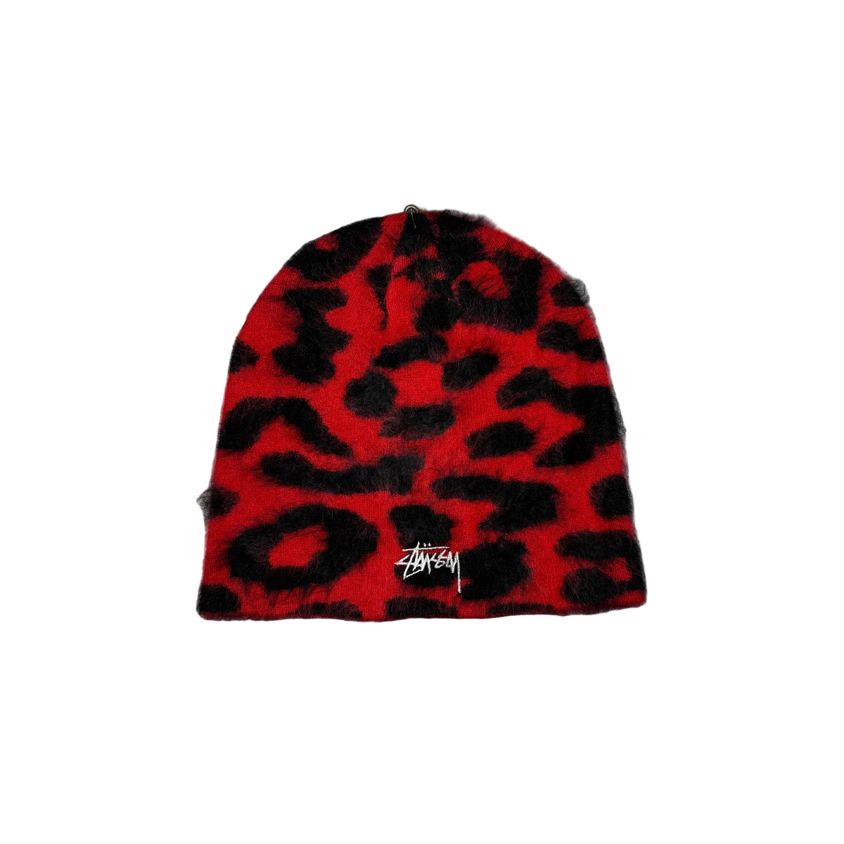 A fuzzy knit beanie hat featuring a red and black leopard print pattern, with a white Stussy logo on the front, displayed against a white background.
