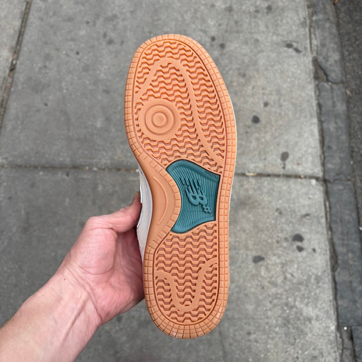 view of gum rubber outsole on new balance skateboard shoe