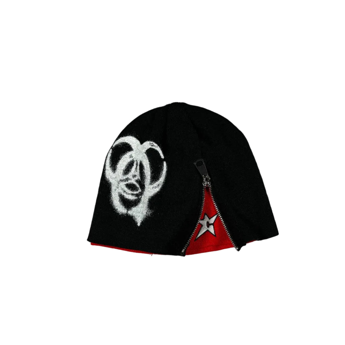 A black knit beanie with a white spray-painted biohazard symbol on the front, a red zipper panel on the side, and a red interior lining, laid flat on a white background.