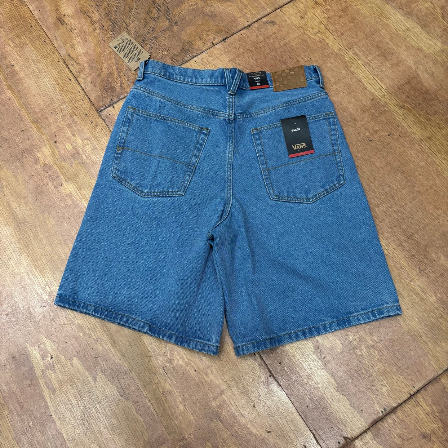 Rear view of light blue baggy denim shorts