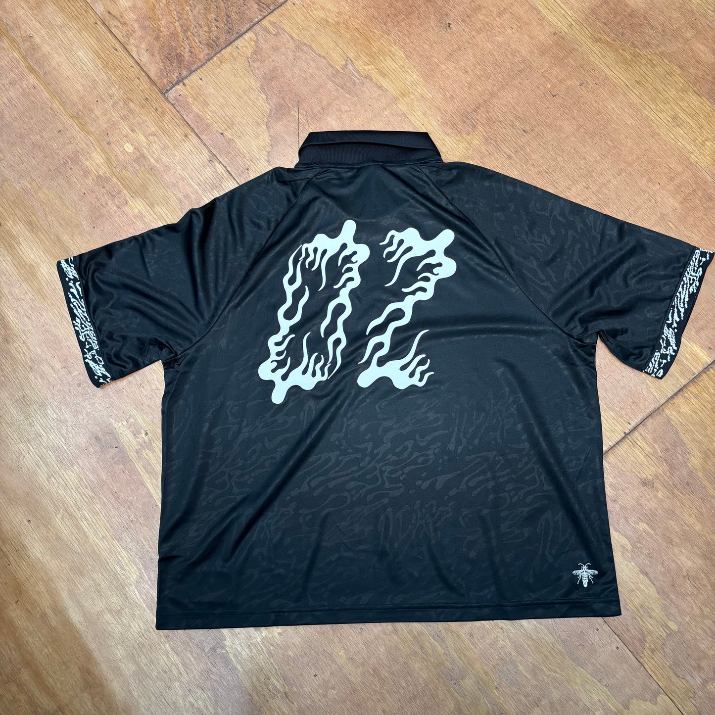 rear view of Collared dry fit jersey