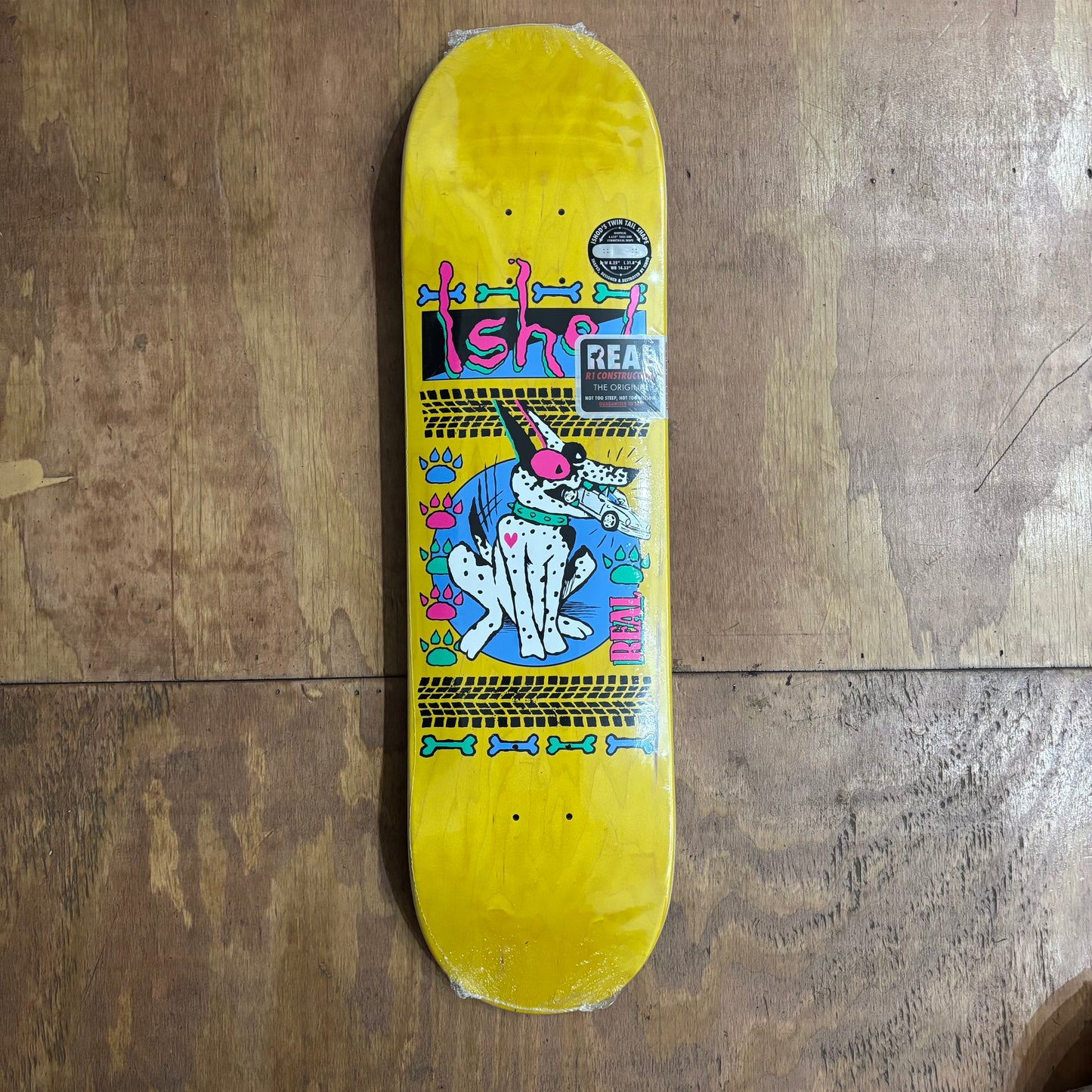 real ISHOD 80s style logo on yellow woodgrain