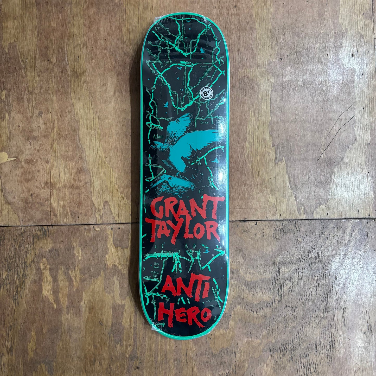grant taylor green and red and black skateboard deck wiith a bird size 8.5