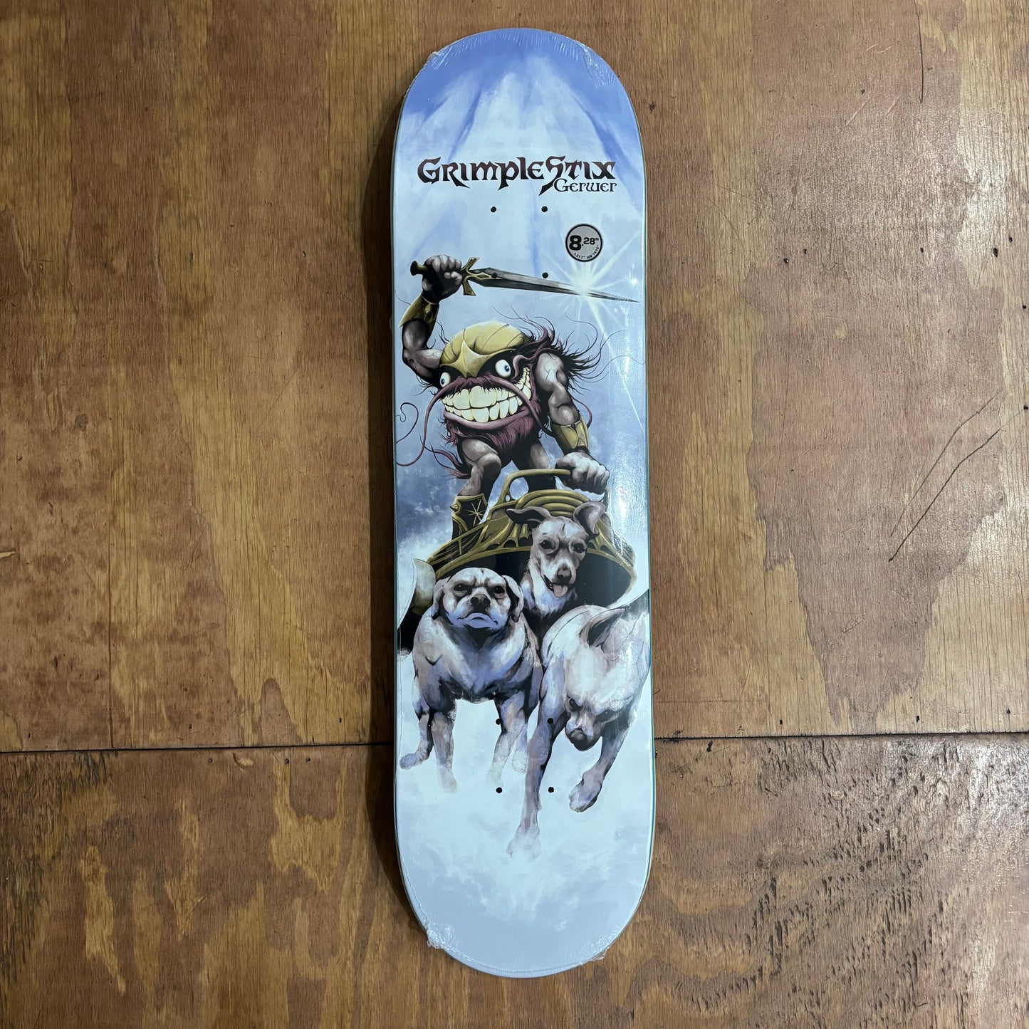 Light blue multi color fantasy esque graphic of a grimple guy riding a chariot pulled by small dogs