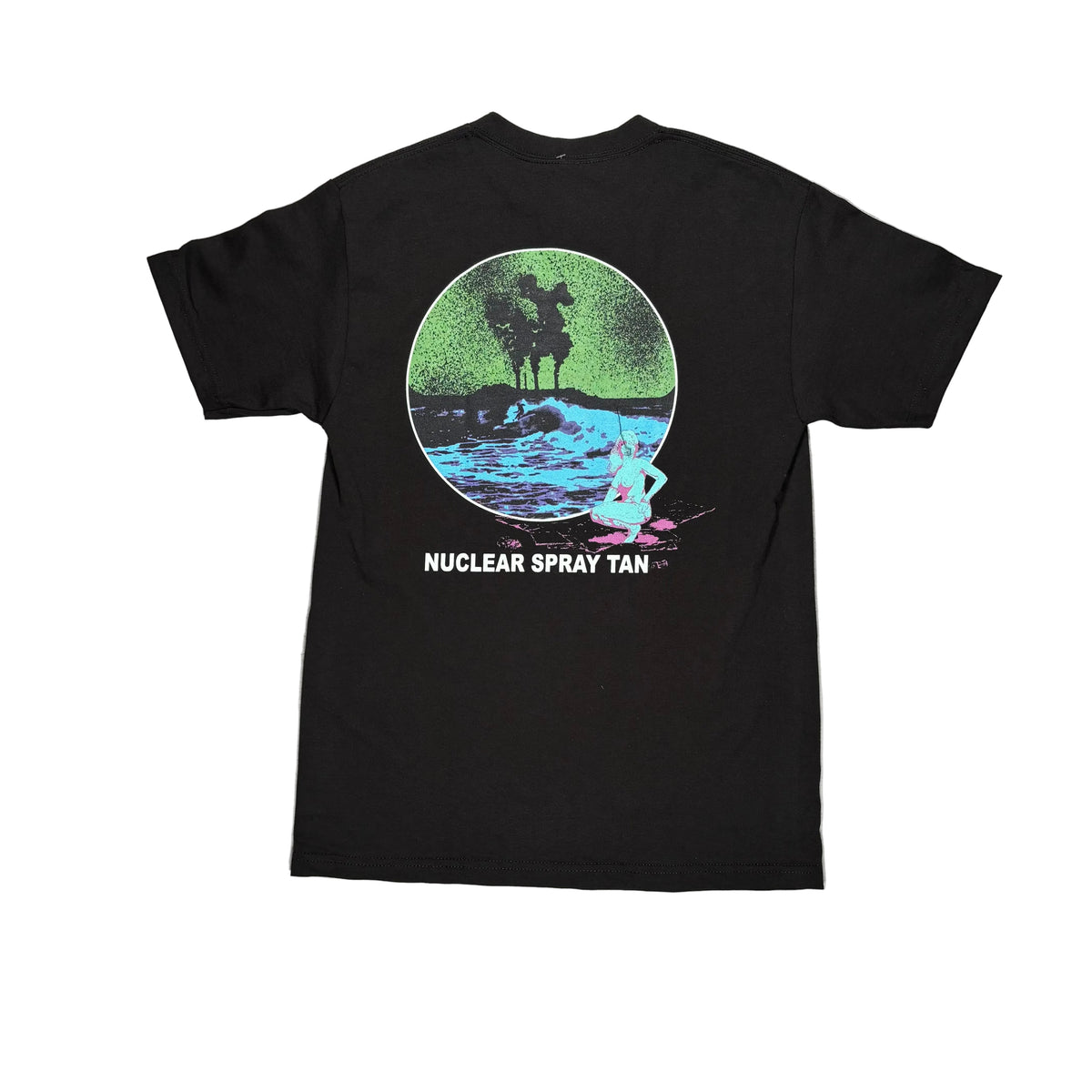 Back of black T-shirt with a blue and green ocean scene in a circle and text reading Nuclear Spray Tan. Displayed on a white surface