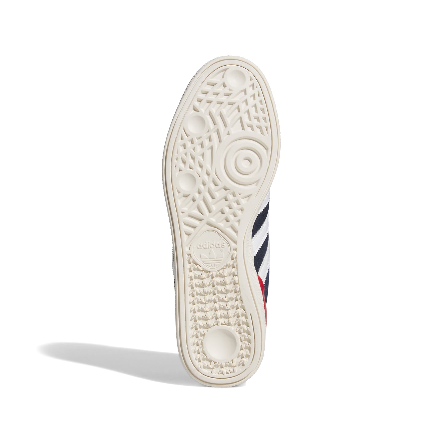 view of white outsole on navy lowtop suede sneaker