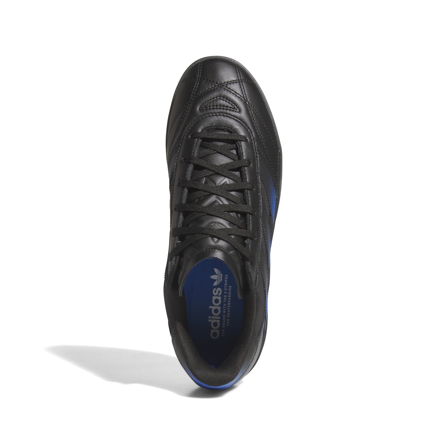 Black Adidas skateboard shoe on a white background