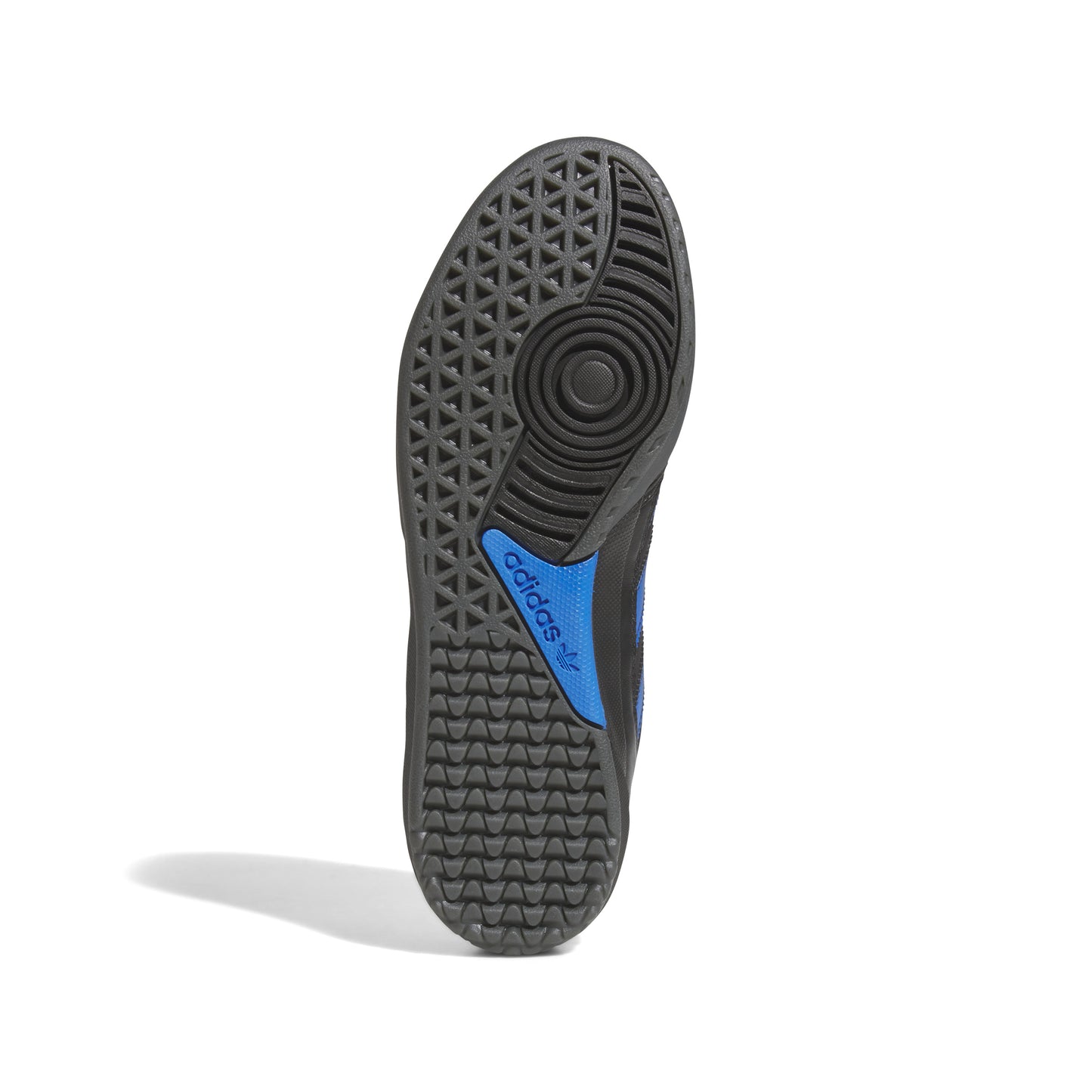 Adidas shoe sole with tread pattern on a white background