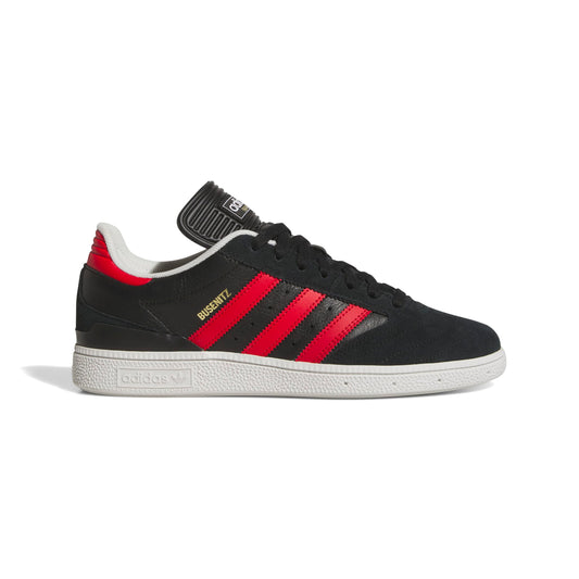 side view of red and black lowtops suede and leather skateboard sneaker
