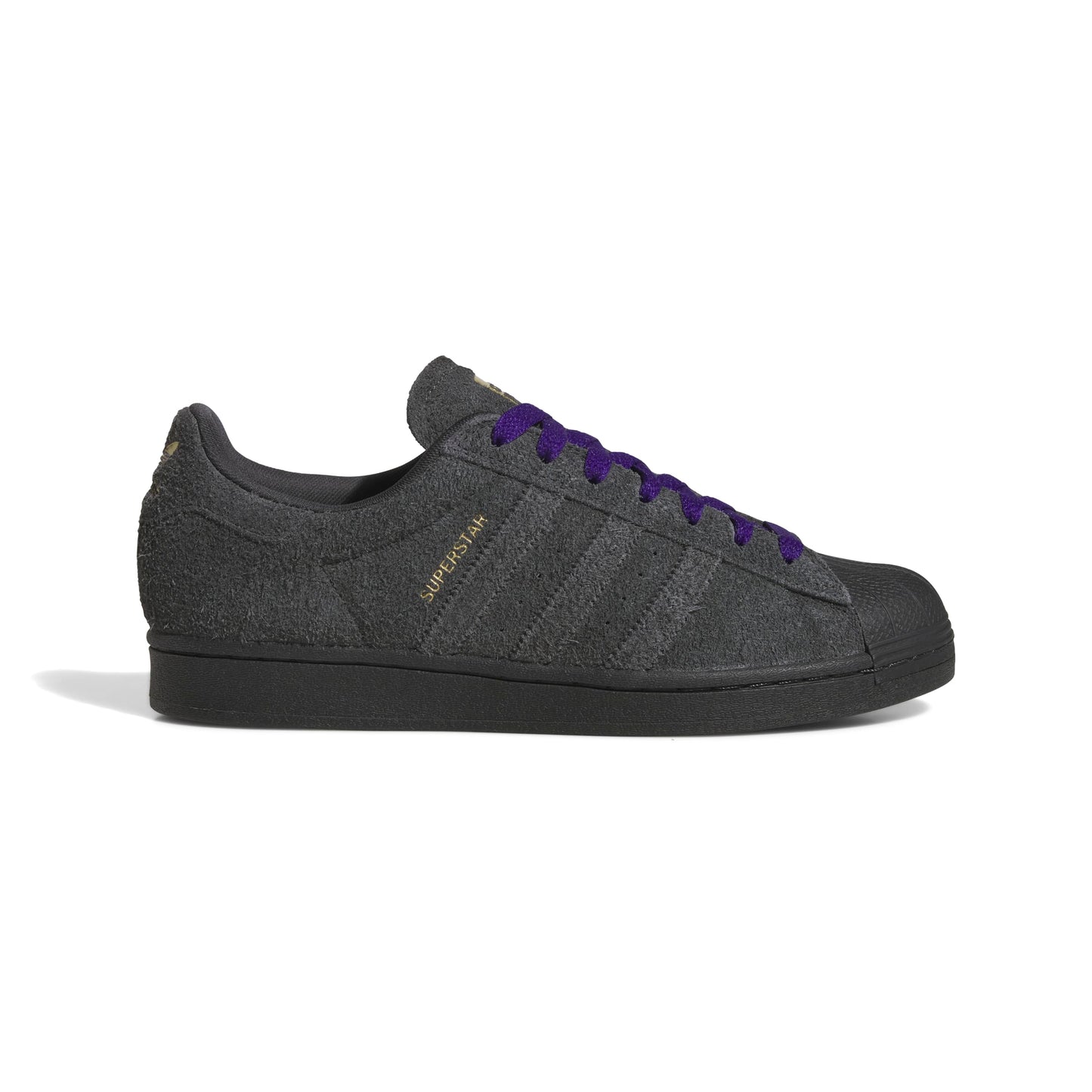 Gray Adidas sneaker with purple laces on a white background