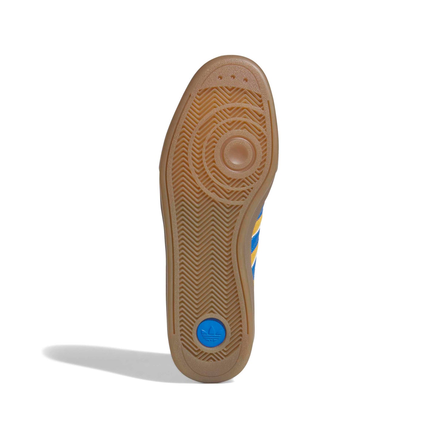 Close-up of a shoe sole with a blue circular logo on a white background