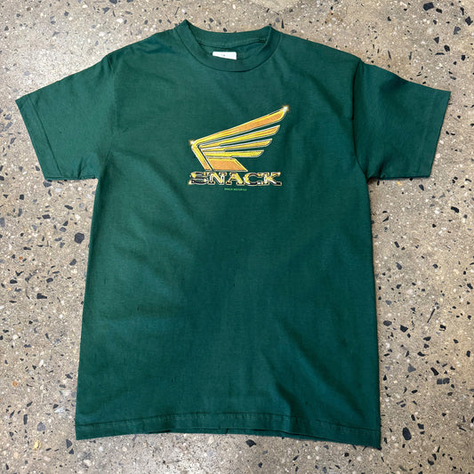 yellow wing logo on green T-shirt