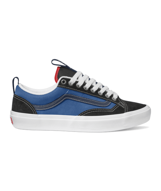 side view of navy and black suede and canvas lowtop skateboard shoe
