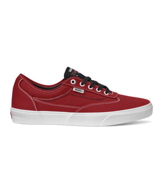 side view of red suede and canvas lowtop skateboard shoe
