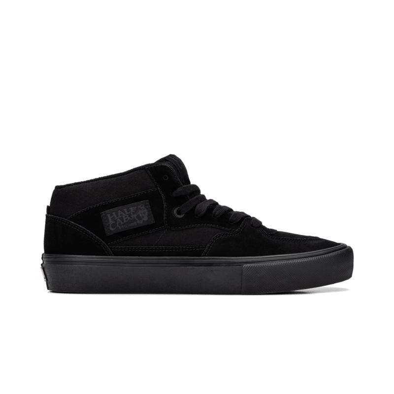 Side view of all black half cab skateboard shoe