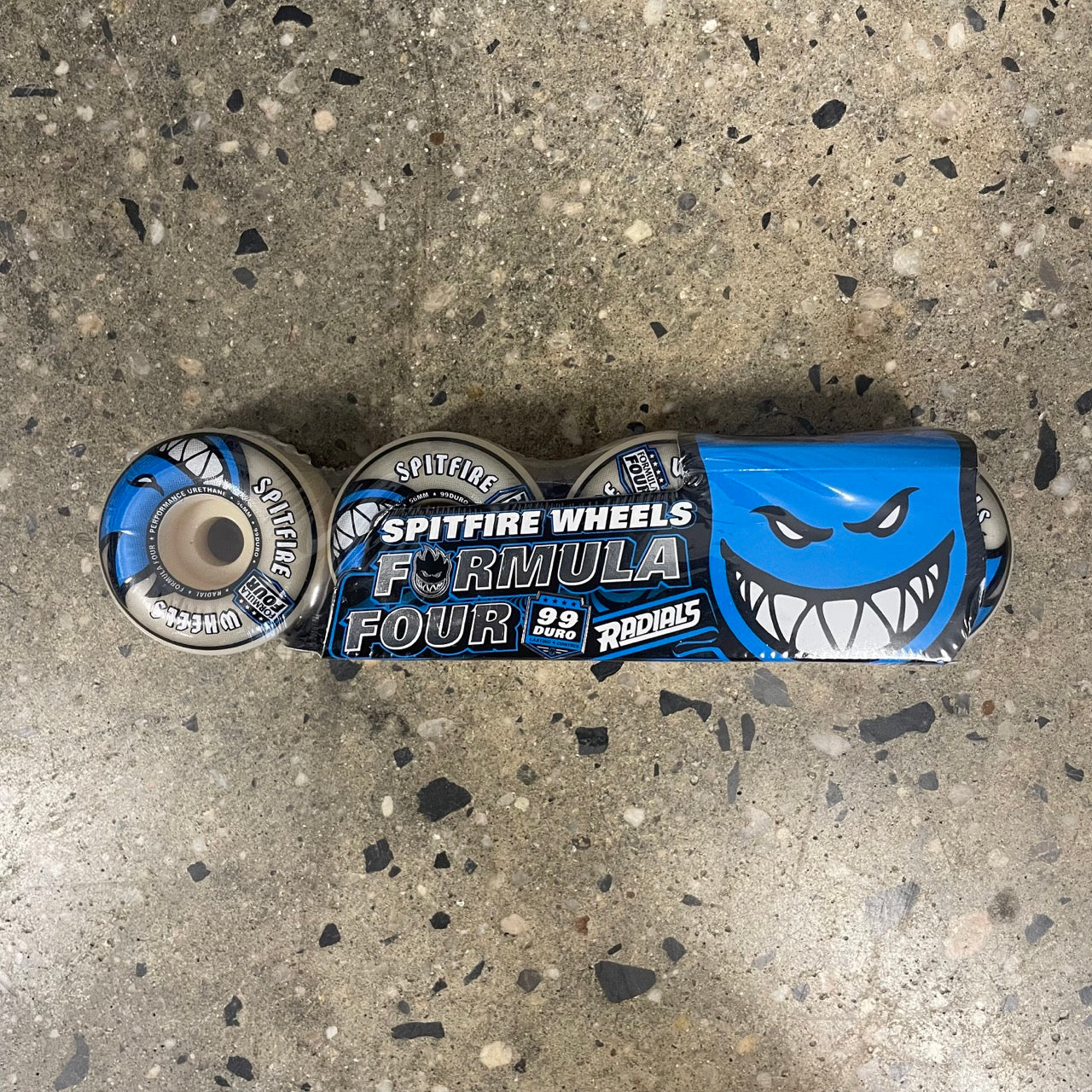 blue and grey graphic on white wheels