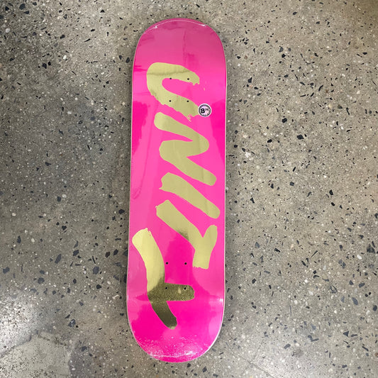 gold unity logo on pink skate deck