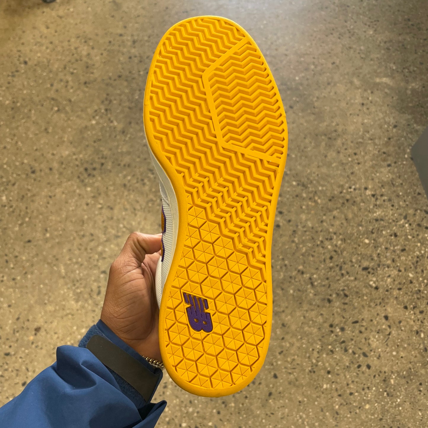 yellow sole, bottom of sneaker