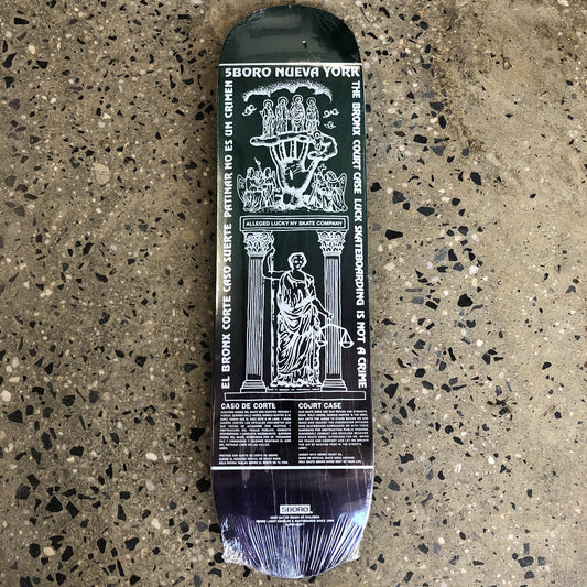 dark blue skateboard with white text and drawings