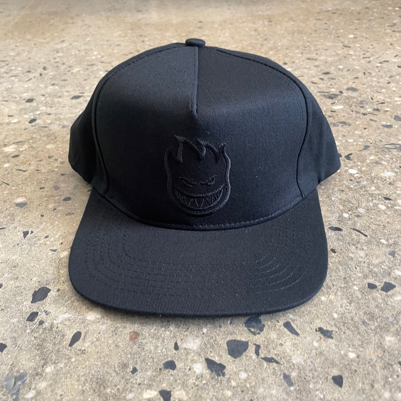 black hat with black logo