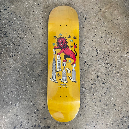 5boro TR Team Skate deck, Lion standing on building tops, red and yellow