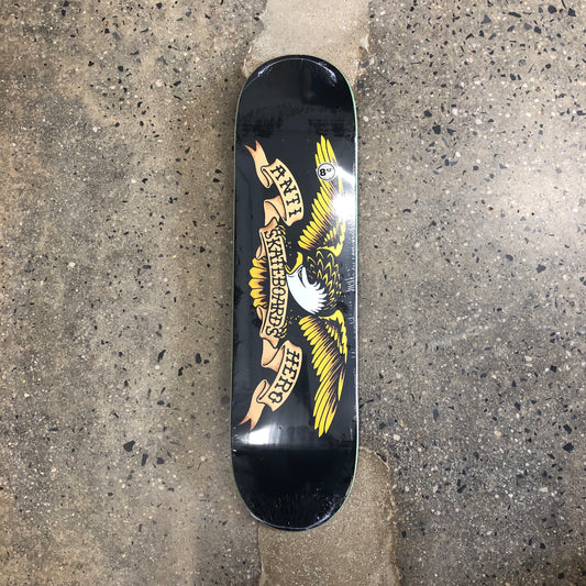 yellow eagle with spread wings logo on black skate deck
