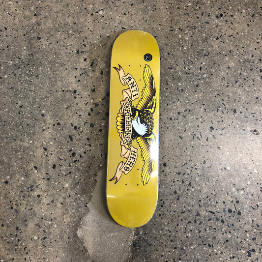 Eagle with spread wings on yellow background skate deck
