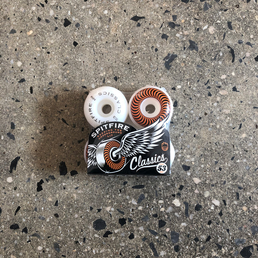 white wheels with orange and black design