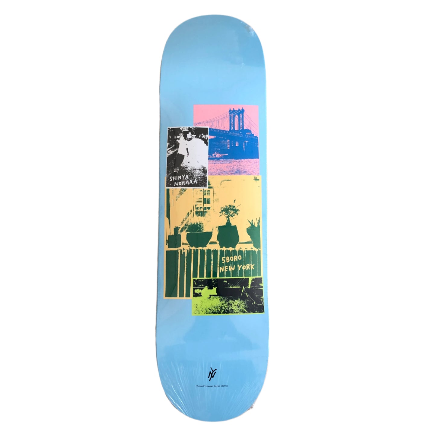 blue skateboard with a photo collage in the middle and small black text