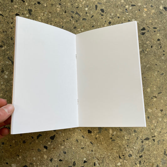 view of open blank pages of book