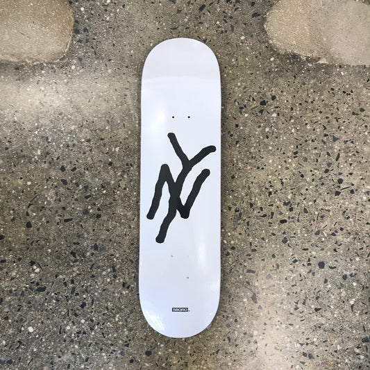 white skateboard with a black NY graphic