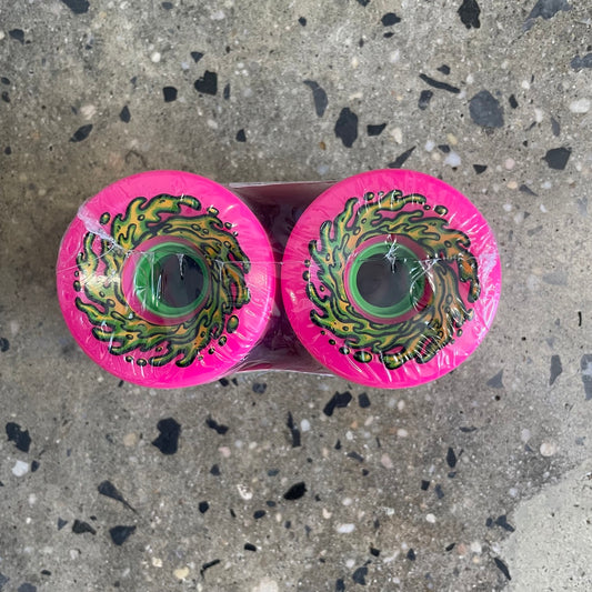 pink wheels with green and yellow design, top view