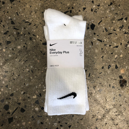 white socks with small black nike swoosh