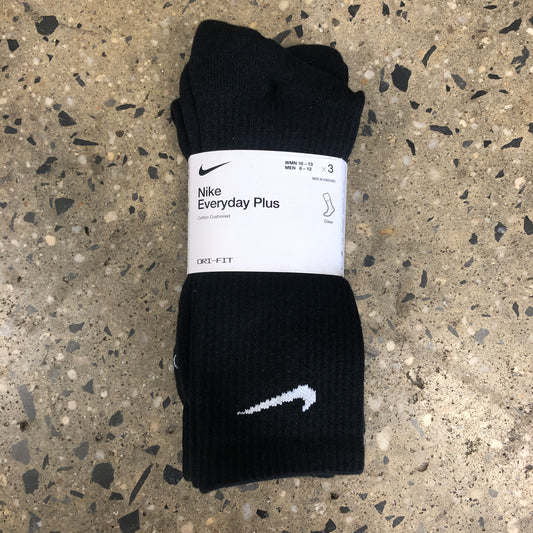 black socks with small white nike swoosh