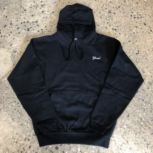 Left chest embroidered grand script logo on black hoodie