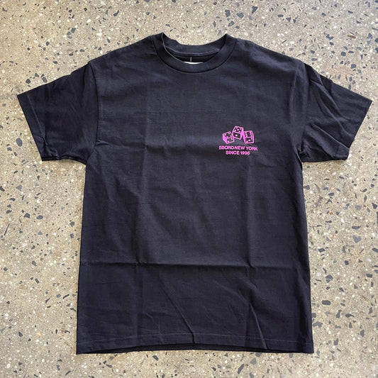 Three dice logo, with 5boro new york since 1996 written underneath, pink ink on black t-shirt, front left chest