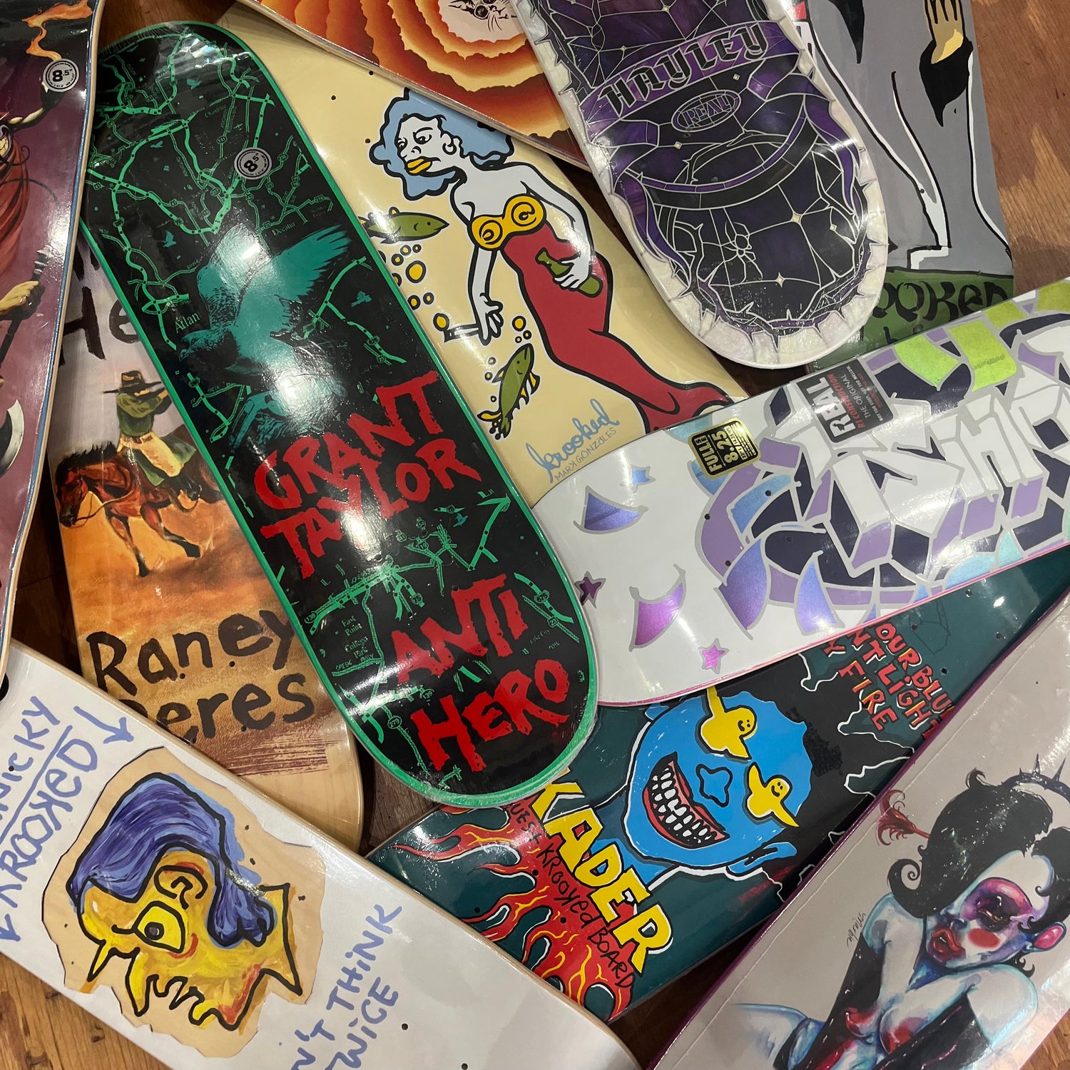 Assorted Deluxe skateboard decks