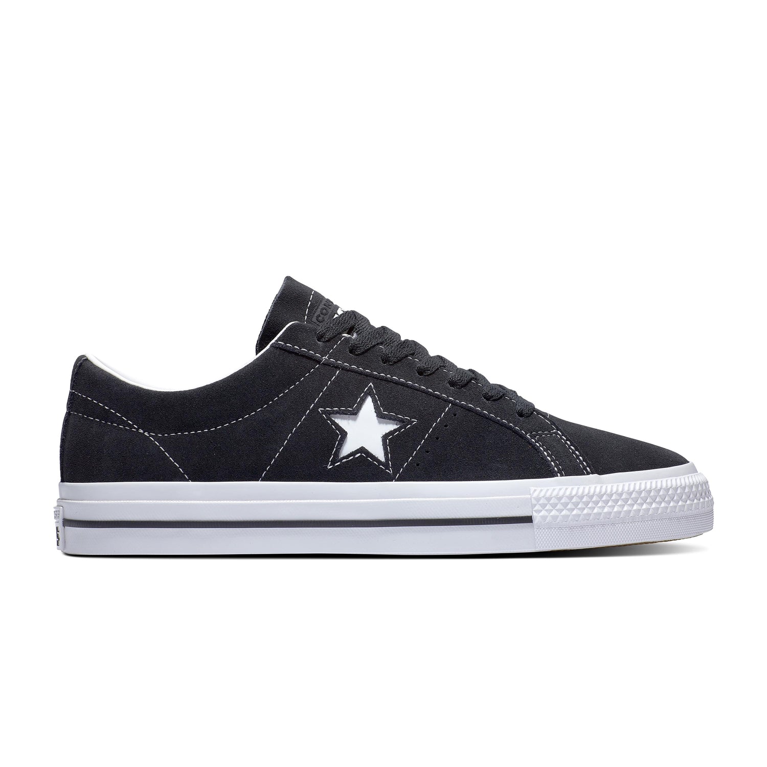 side view of black/white low top suede skate shoe with one star logo