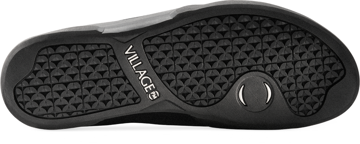 view of black gum rubber outsole of shoe